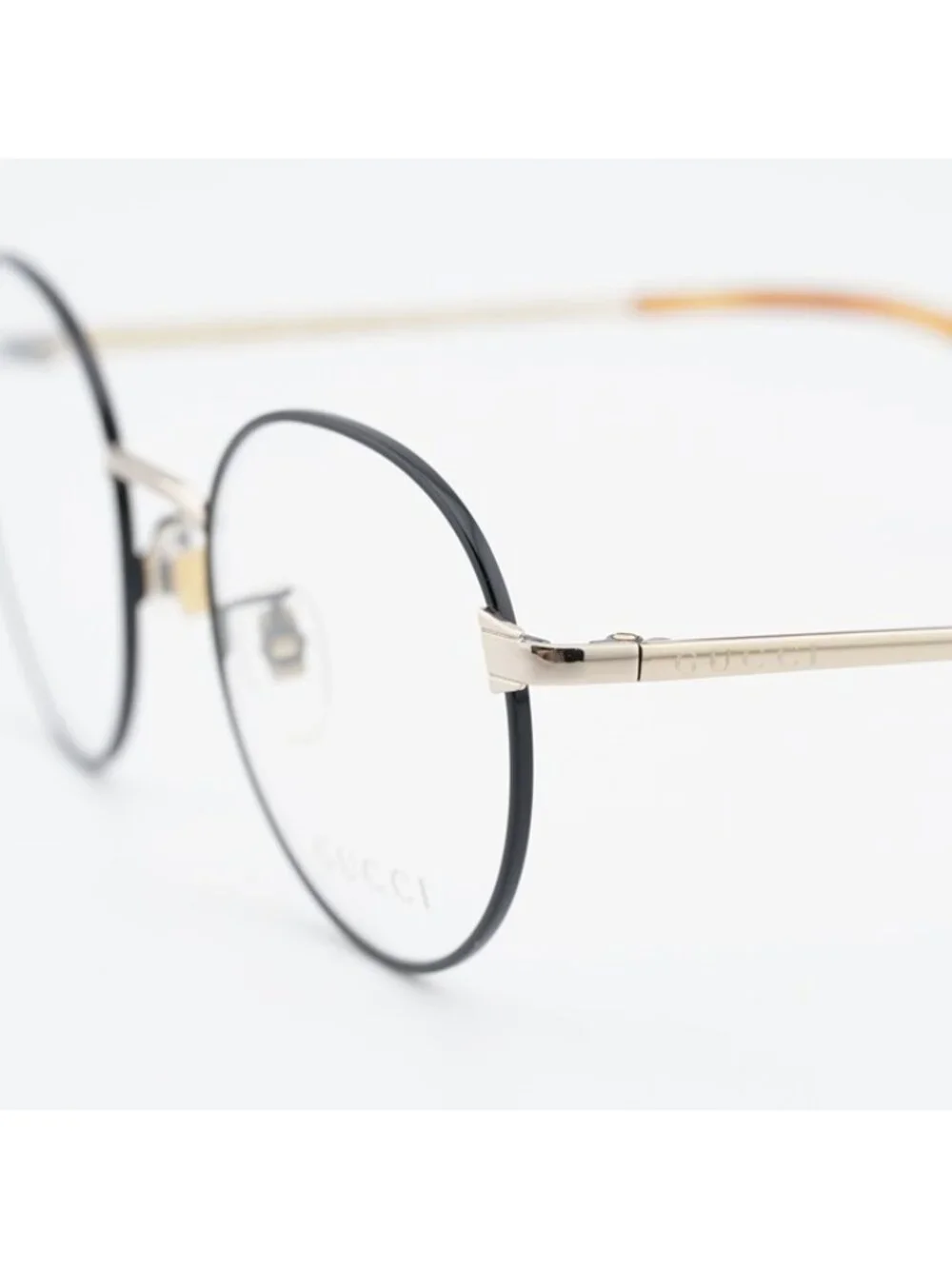 Gucci GG0581O 006 Eyeglasses Black/Gold 50mm Round Frame